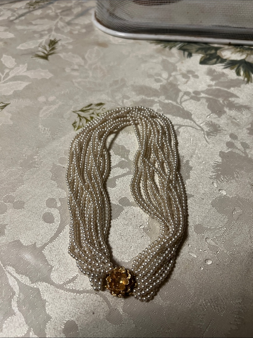 Multi-Strand Ivory Pearl Necklace with Gold Flower Clasp